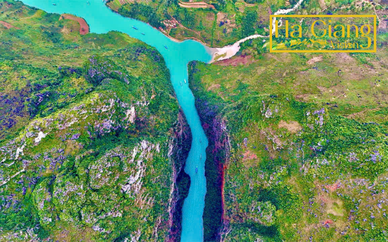 The Nho Que’s emerald water shifts with seasons, enchanting all travelers.