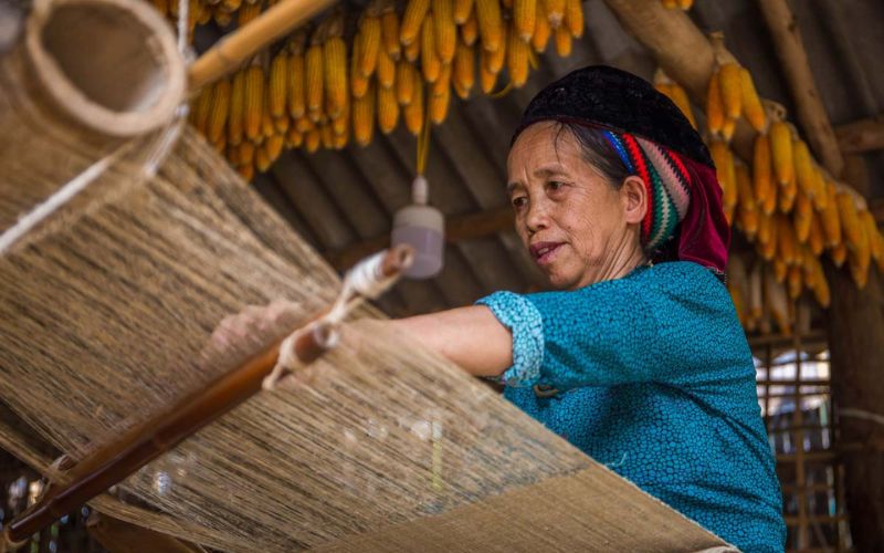 Hmong artisans teach weaving techniques and embroidery passed through generations.