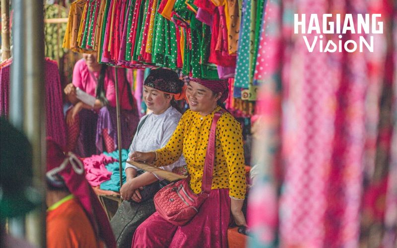 Colorful handmade textiles reflect the cultural identity seen at Pho Cao Market.